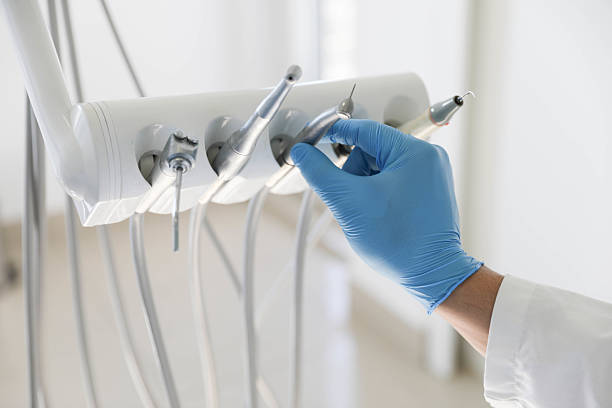 Professional Tooth Extraction technician working in Springville, NY